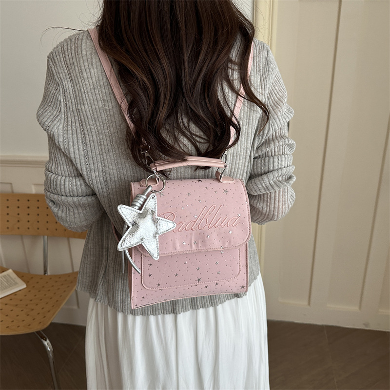 Mochila de moda coreana Full Sky Star 2026 nuevo estilo coreano estilo académico letras versátiles mochila de mano casual