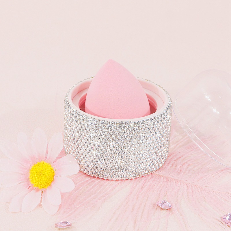Caja de almacenamiento de huevos de belleza con incrustaciones de diamantes súper suaves a prueba de polvo, maquillaje sin polvo, valor alto, delicado, seco y húmedo, vestido, botella vacía