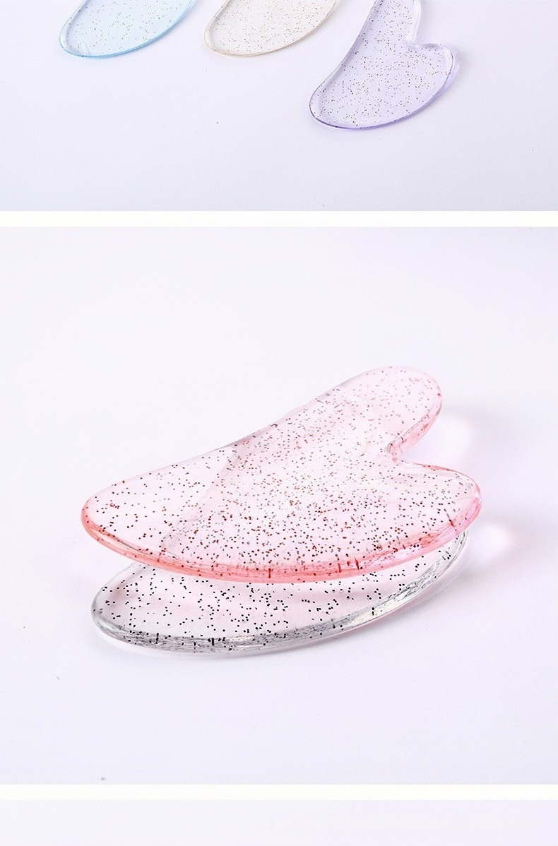 Heart Shaped Gua Sha Facial Massage Tool Resin Scraping Board for Face and Body Care in use