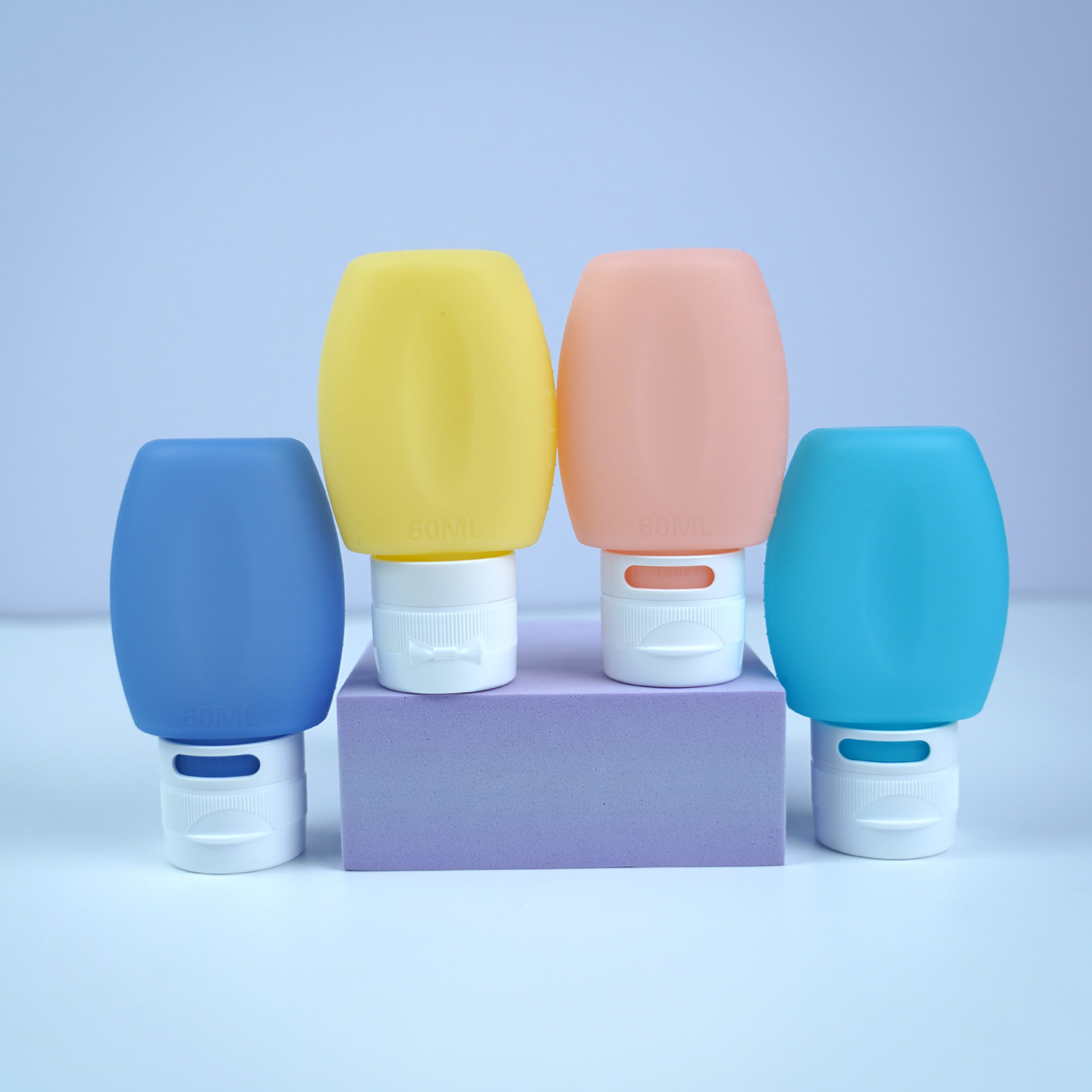 Botella dispensadora de silicona de grado alimenticio, botella exprimible, juego de botellas de almacenamiento portátiles para viaje, fabricante de suministro transfronterizo