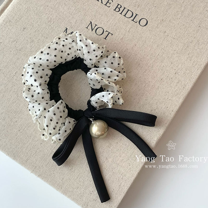 Douyin Explosite 2025 nuevo estilo de alta gama lazo de lazo lunares intestino grueso lazo para el cabello accesorios para el cabello de cuerda para la cabeza de mujer