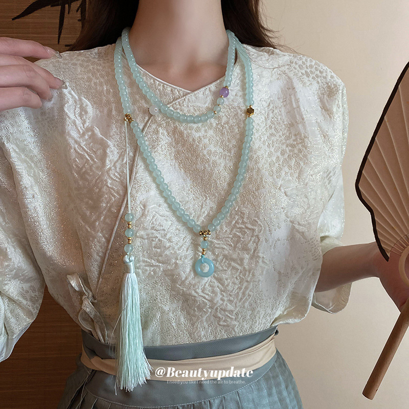 Estilo antiguo Zen azul azul vidrio borla collar nuevo estilo elegante estilo chino tapeta de presión cadena lateral estilo caliente falda de caballo accesorios mujeres