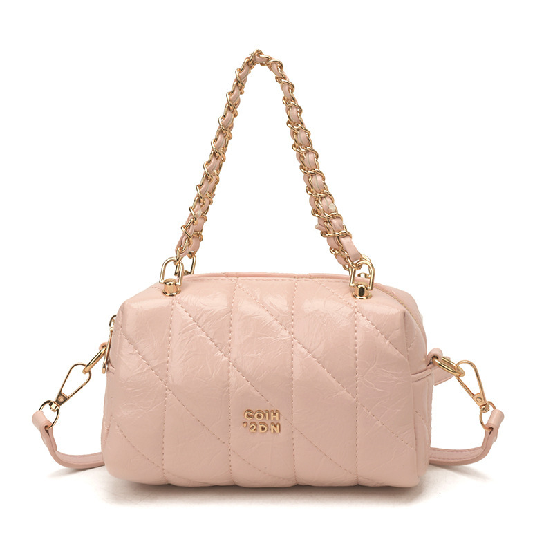 Bolsa de estilo de viaje de cadena de diamante para mujeres 2026 nueva sensación diaria de estilo extranjero bolso de hombro otro medio