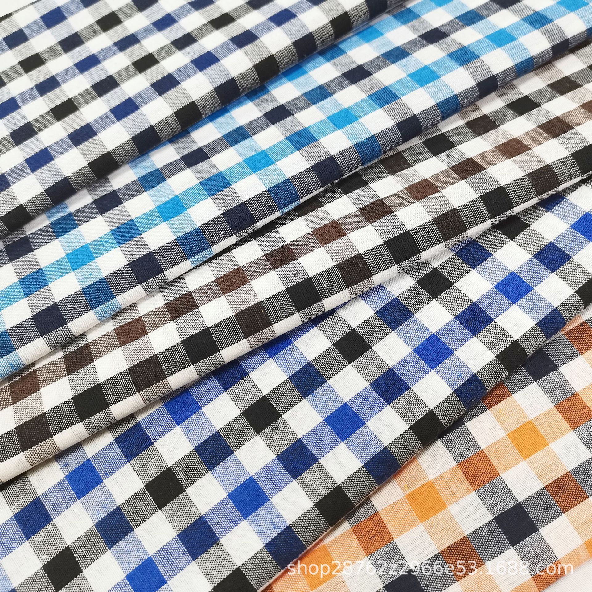 现货涤棉朝阳格子布春夏休闲服衬衫面料21支平纹色织格子装饰布