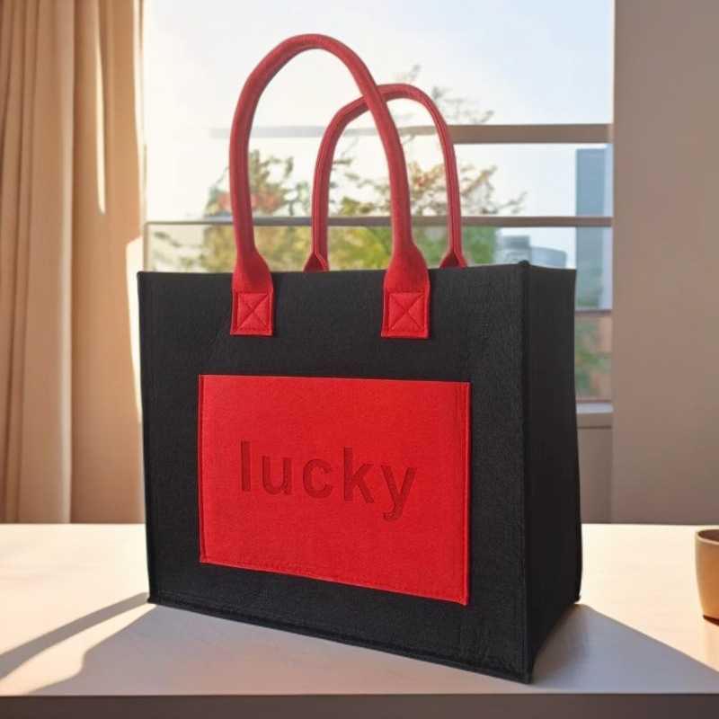 Spot fieltro bolso de gran capacidad celebridad de Internet simple viaje a juego de color portátil pequeño libro rojo bolso de fieltro de un solo hombro