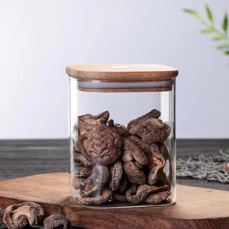 Fábrica al por mayor borosilicato cuadrado sellado tarro nuevo tarro de té de vidrio transparente tarro de almacenamiento de dulces snack tarro