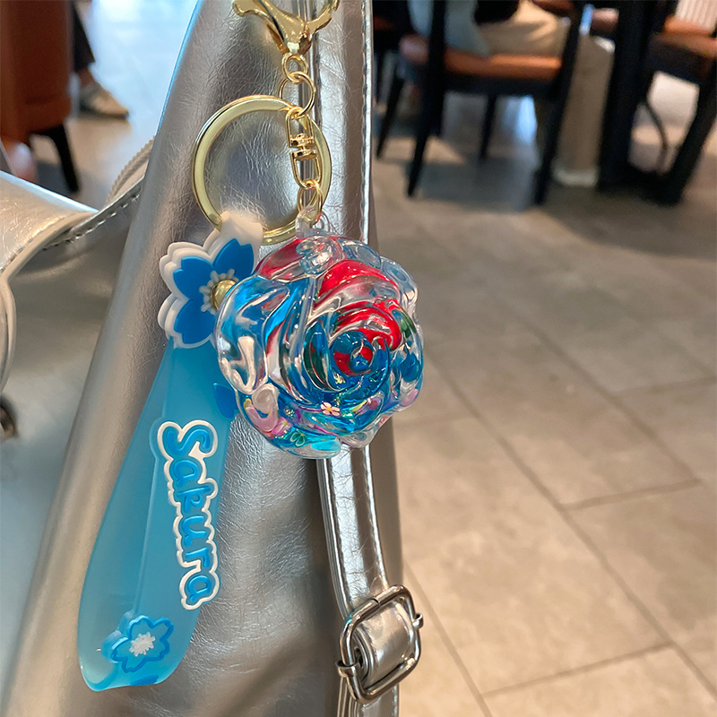 Iteret Celebrity Oil Doll Liquid Sad Bottle Keychai For Wome Exquisite Cute Cartoo Rose Pedat Backpack_voghion.com