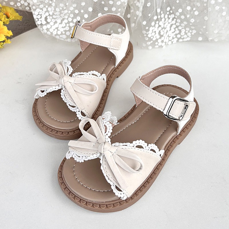 Sandálias de niñas verano 2026 nuevo estilo de moda infantil princesa zapatos de sol suave zapatos de playa de bebé arco image 6