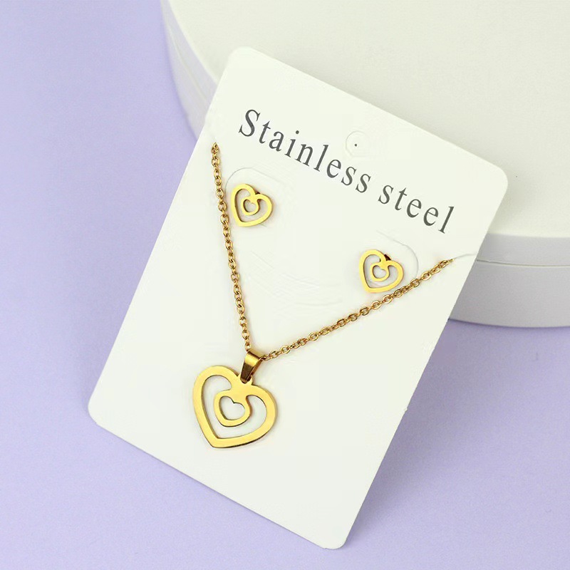 Net Red Butterfly Love Cross Personalidad Simple Juego de joyas de acero inoxidable Pendientes de oro Juego de collar al por mayor