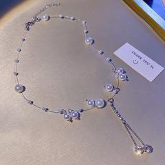 european and american super fairy zircon tassel necklace women's high sense vintage pearl fishing line clavicle chain all-match hot girl jewelry details Picture