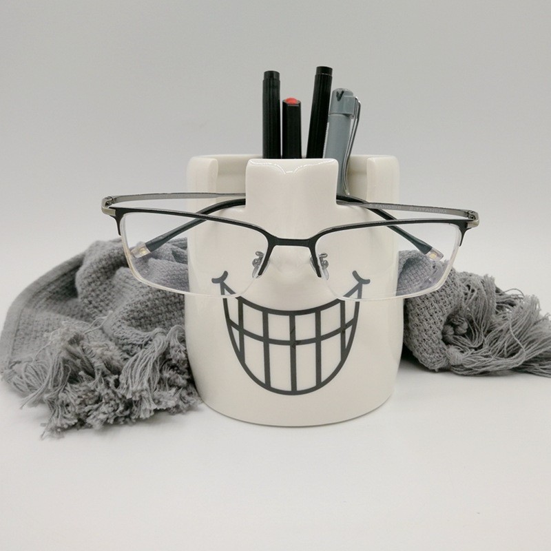 Portalápices de cerámica europeos y americanos transfronterizos personalizados Portalápices de cerámica de colores Portalápices de escultura facial Portalápices de gafas Labios rojos Portalápices