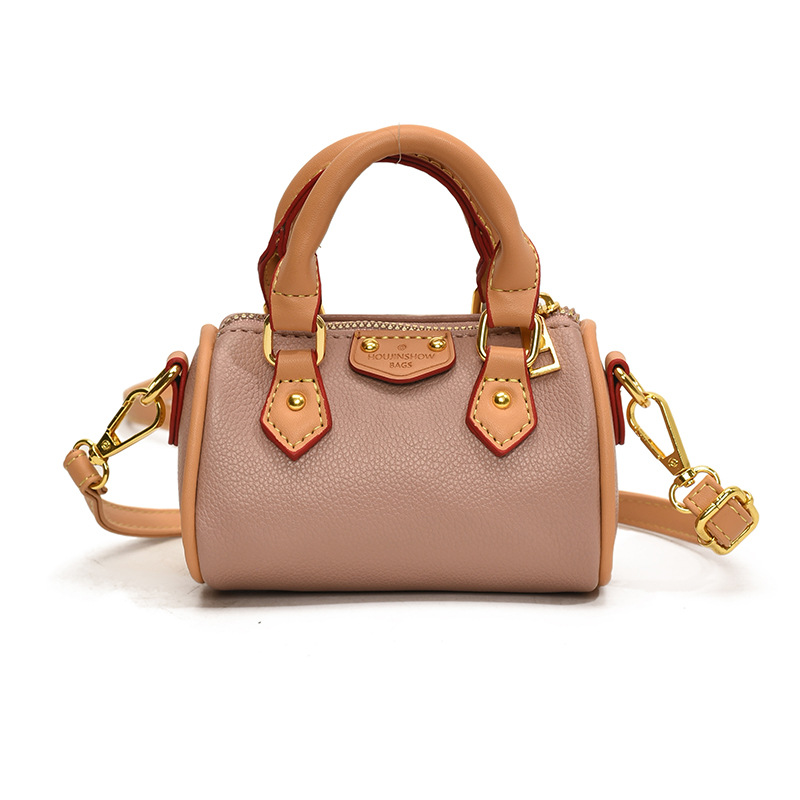 Bolso de niña coreana moda contraste color estilo occidental mini bolsa de tubo de bebé 2025 nuevo bolso de almohada para niños