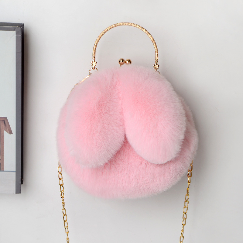 复制_2021新款兔耳朵包手提毛绒链条包包女士.jpg
