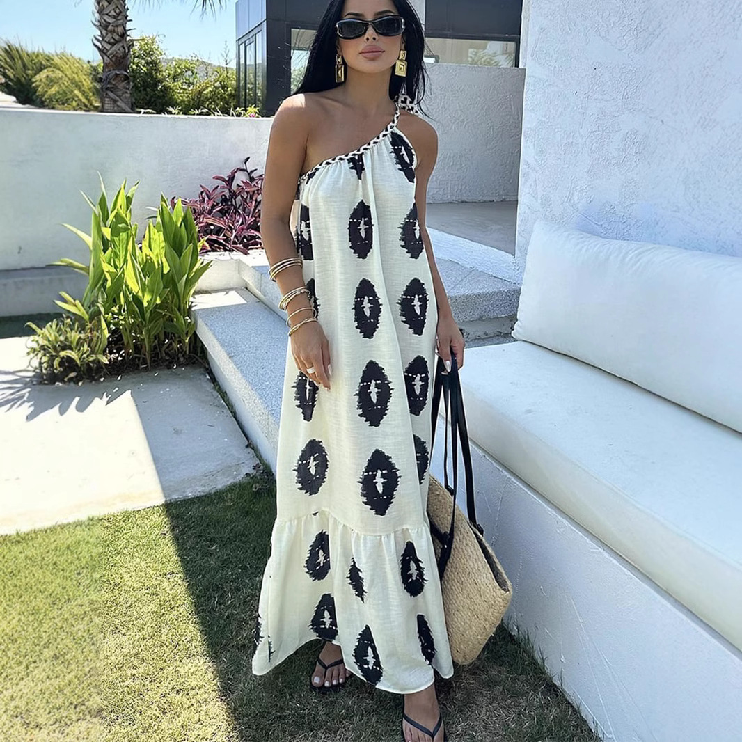 국경 간 대외 무역 유럽과 미국 스타일 원피스 2025 여름 새로운 프랑스 디자인 감각 싱글 피스 스트랩 비치 스커트 여성용 스커트