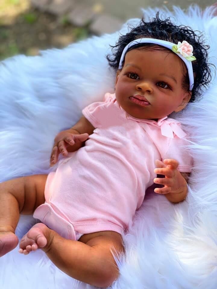 50cm simulación muñeca negro piel rosa mameluco muñeca Lanny transfronteriza Venta caliente suministro de una sola pieza de entrega