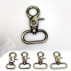 Guangzhou sourced Qinggu zinc alloy clip hooks for metal boxes and bags, casting hook fasteners for clothing and accessories hardware