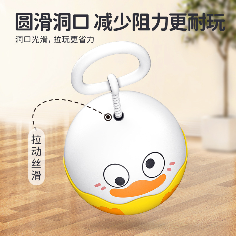 Niños girando volante luminoso tirando silbato juguetes de puzzles ejercicio mano-ojos coordinación cuerda tirando de la cuerda tirando de la bola voladora chico