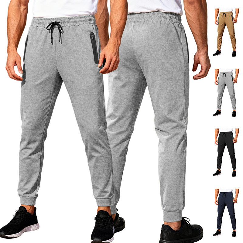Nuevos pantalones de fitness de hombre transfronterizos europeos y estadounidenses primavera y verano pantalones deportivos de carreras casuales musculares doctor al por mayor