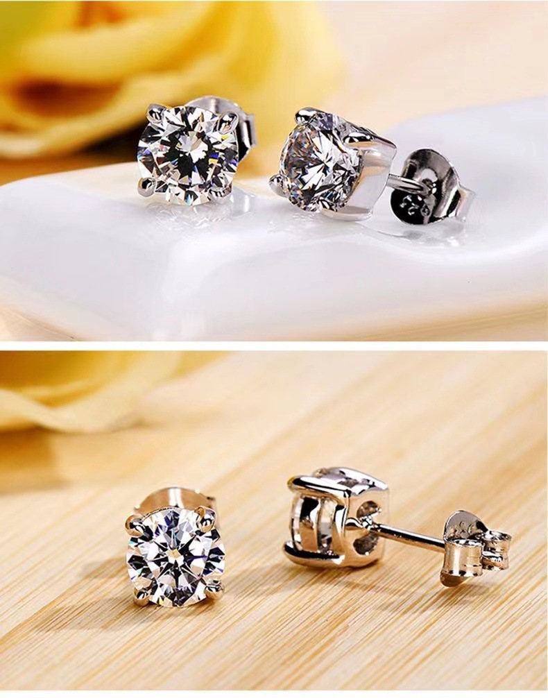 Orecchini chic in argento a quattro griffe gioielli unisex_voghion.com