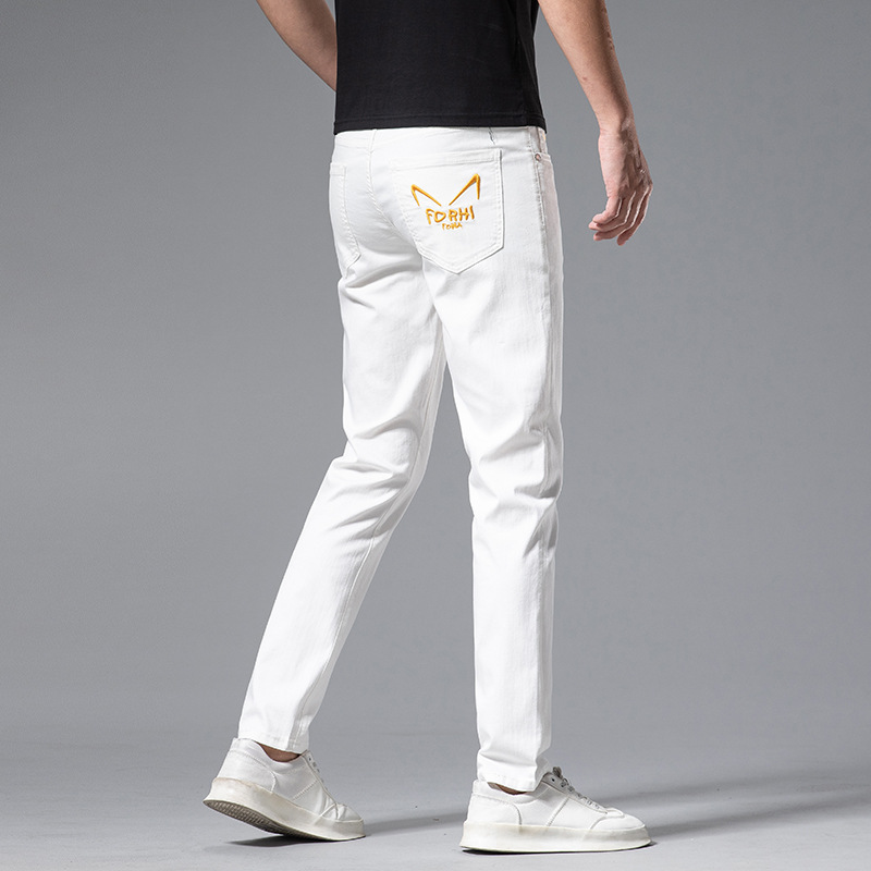Jeans alla moda da uomo sottili primavera/estate Pantaloni con piedi elastici in cotone bianco slim fit ricamati di marca di fascia alta_voghion.com
