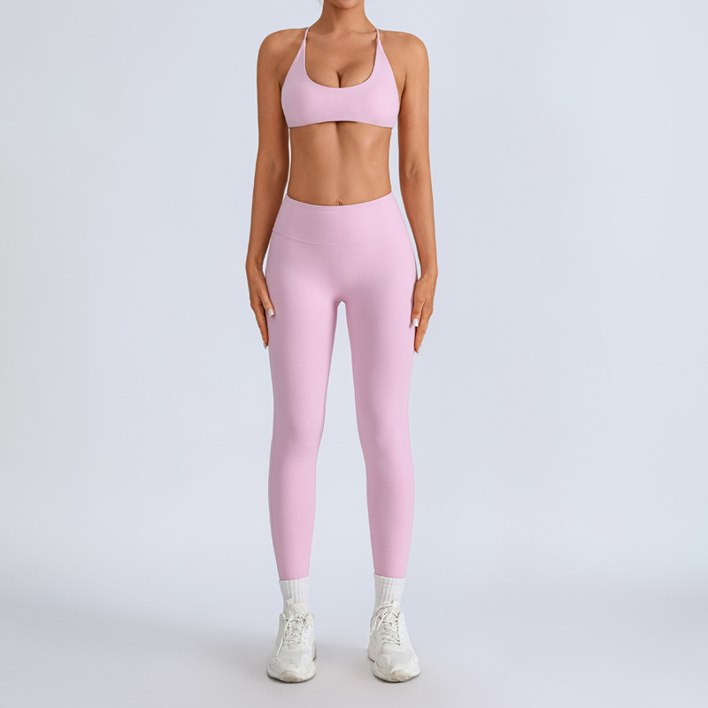 Traje de yoga europeo y americano transfronterizo, espalda hermosa con almohadilla para el pecho, sujetador con tirantes cruzados, pantalones deportivos de secado rápido de melocotón de cintura alta