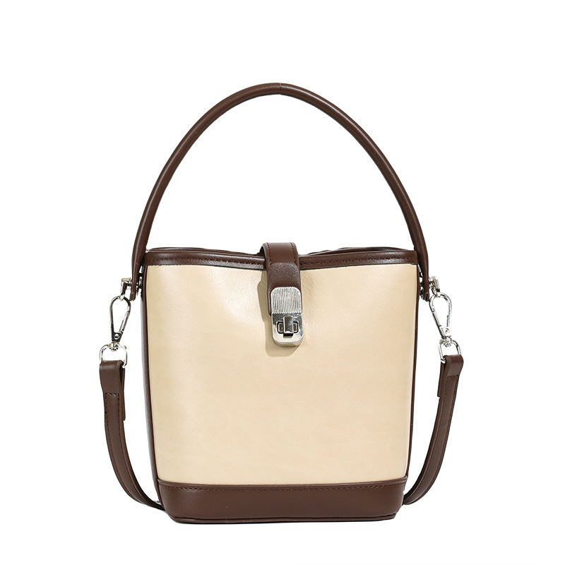 Bolsa de mano coreana de nicho universal, dama 2024 nuevo bolso de hombro, bolso de cubo de moda de alta calidad