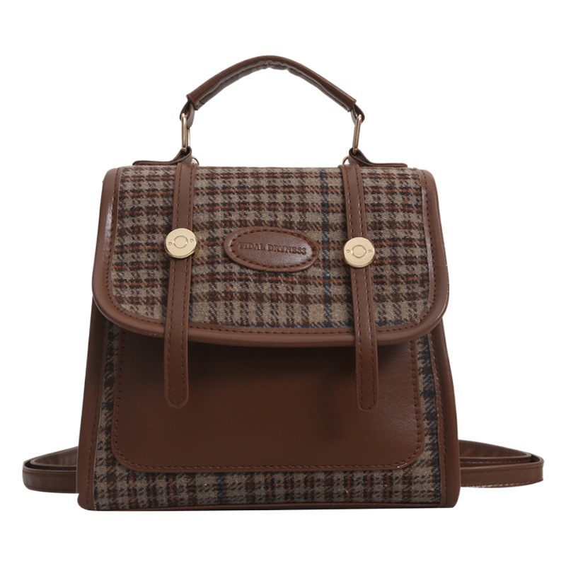 Alta textura simple color sólido estilo coreano bolso de las mujeres 2023 invierno nuevo nicho diseño hombro crossbody bolso