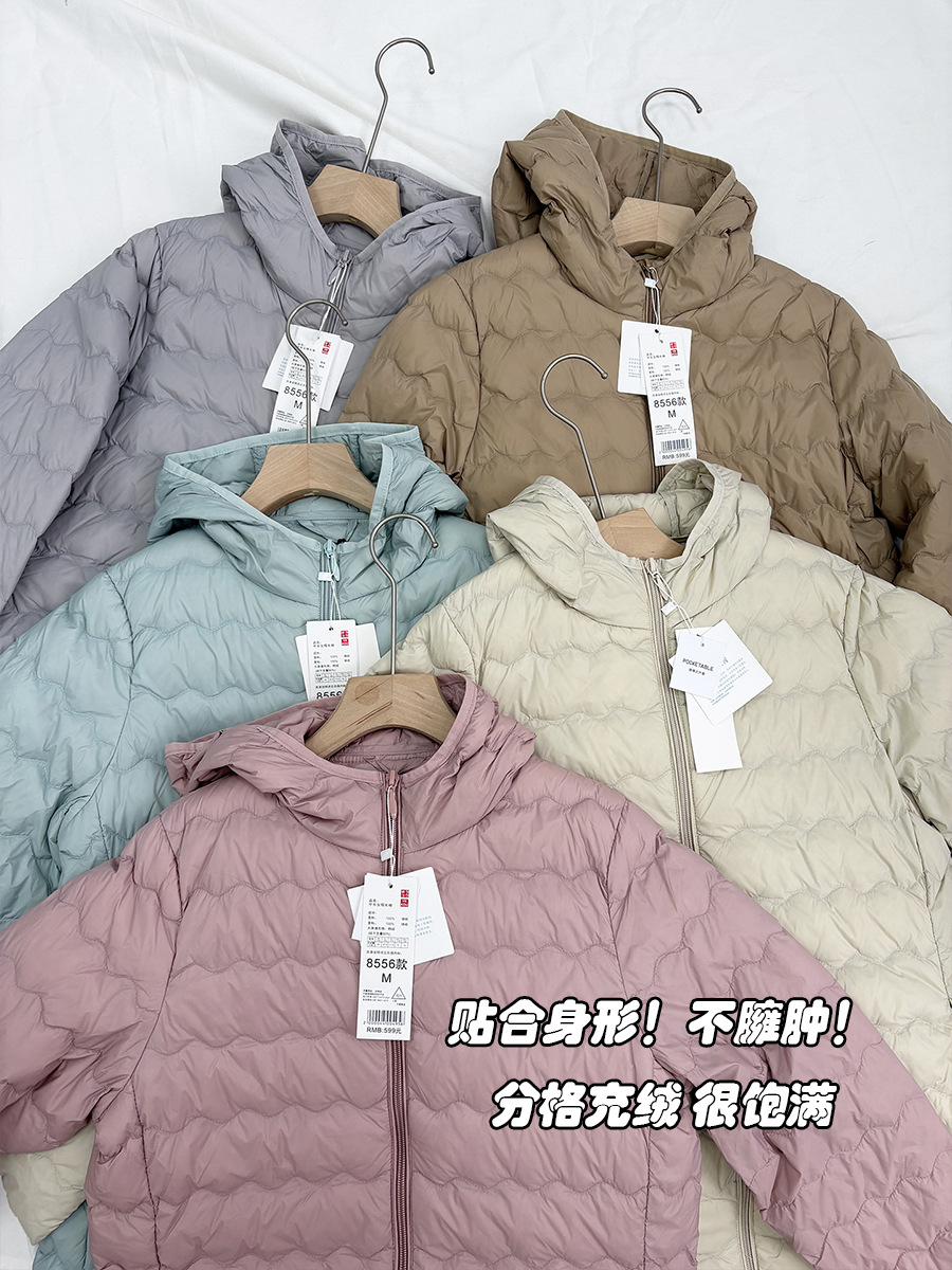 2025 otoño y invierno nueva chaqueta de pluma ligera y delgada mujer larga con capuzas de pluma cálida forro interior de pluma amplia chaqueta suelta