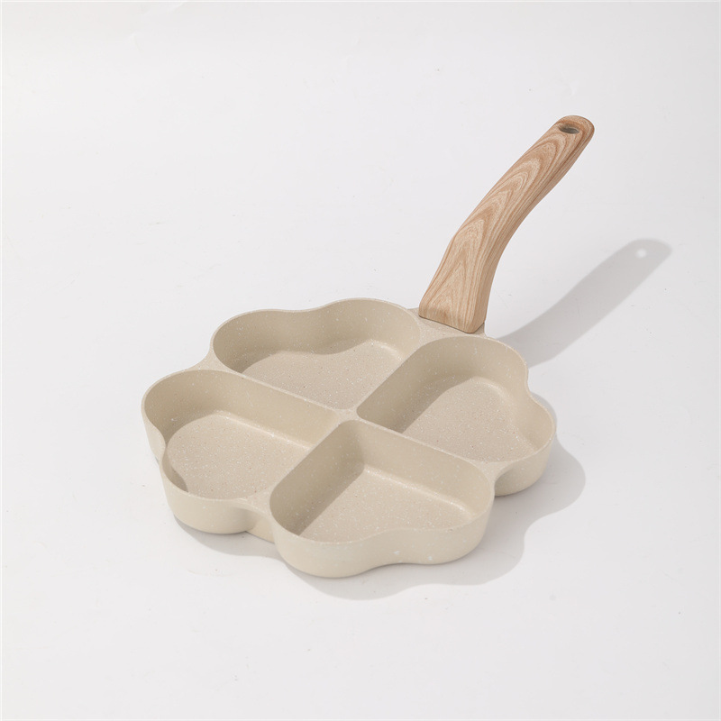 Piedra de arroz casera transfronteriza amor de cuatro agujeros panela de desayuno multifuncional para hamburguesas de tortilla antiadherente