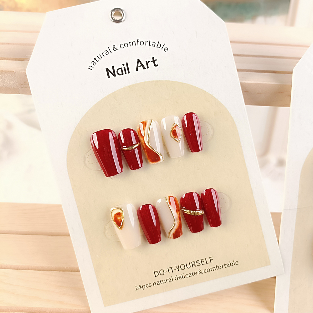 Arte de uñas al por mayor para Año Nuevo, arte de uñas hecho a mano con tendencia nacional roja del Año de la Serpiente, pegatinas de uñas con efecto ojo de gato y fuegos artificiales con un toque de alta gama.