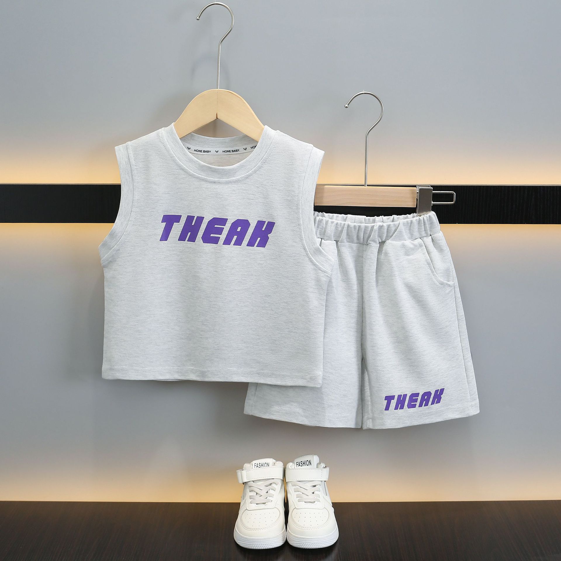 7363 traje de niño verano 2025 nuevos pantalones cortos de chaleco sin mangas delgados para niños estilo de verano deporte de dos piezas verano