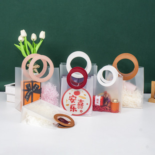 In stock pp frosted transparent handbag New Year gift packaging round thickened handle red wedding gift bag