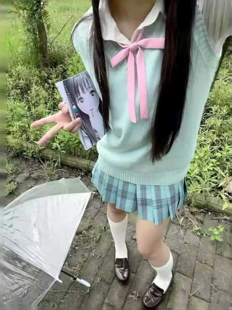 Пуловер-жилет мятно-зеленого цвета без вышивки