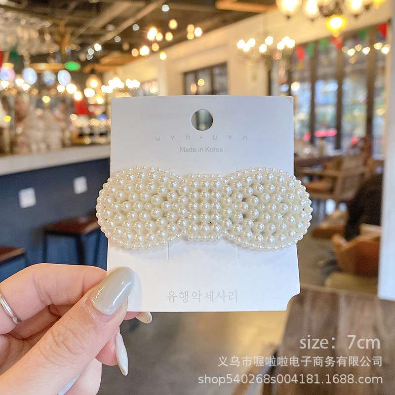 Pasador de pelo de perlas de alta gama estilo francés para mujer, clip para flequillo lateral, elegante clip para el pelo de la frente, accesorio para el pelo tipo pico de pato.