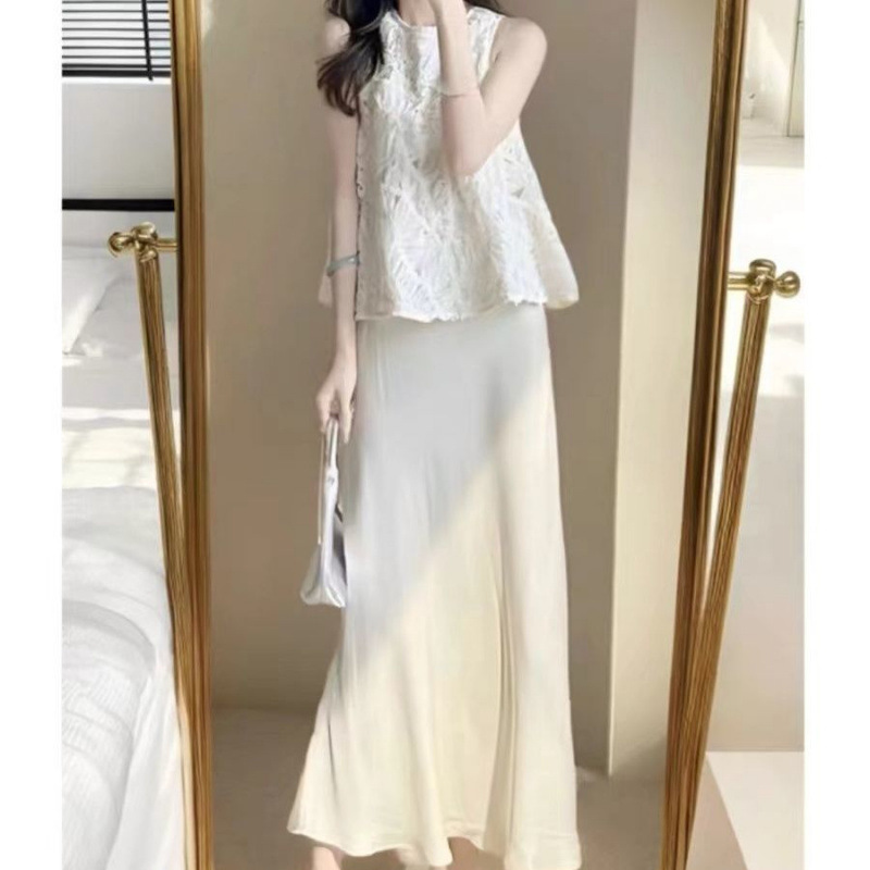 女性の夏の新しいスタイルの優しいスタイルの中空トップとハイウエストスカートのツーピースセットを備えた西洋スタイルの年齢を軽減するファッションスーツ|undefined