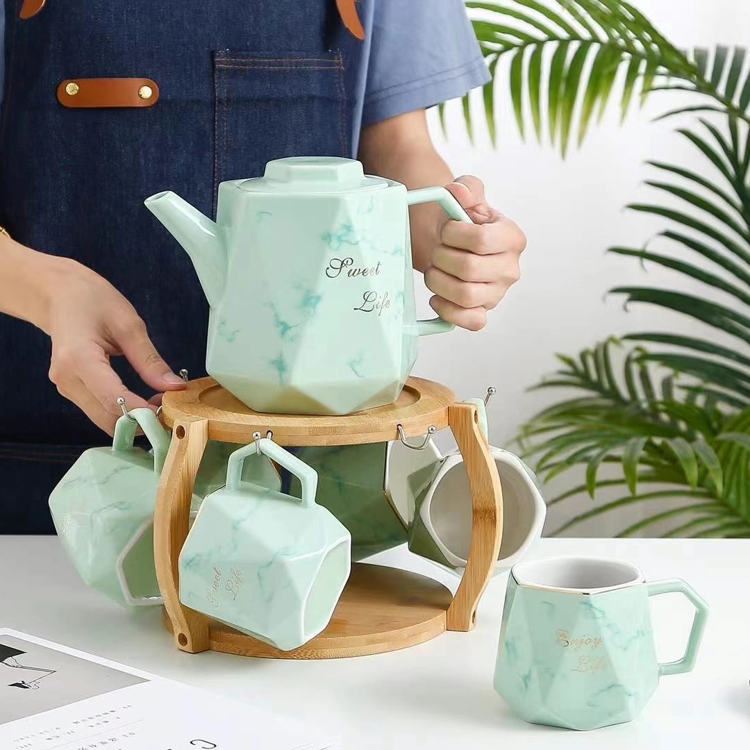 Estilo nórdico creativo conjunto de agua fría traje de cerámica taza con soporte Oficina flor tetera taza de agua marbling