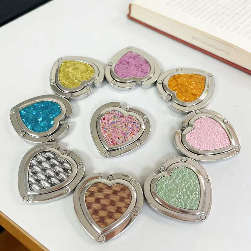 Cross-border in-stock heart-shaped desktop hook, foldable and portable, no-drill table-side bag hook, multi-color, no-punch storage organizer Cross-border in-stock heart-shaped desktop hook, foldable and portable, no-drill table-side bag hook, multi-color, no-punch storage organizer