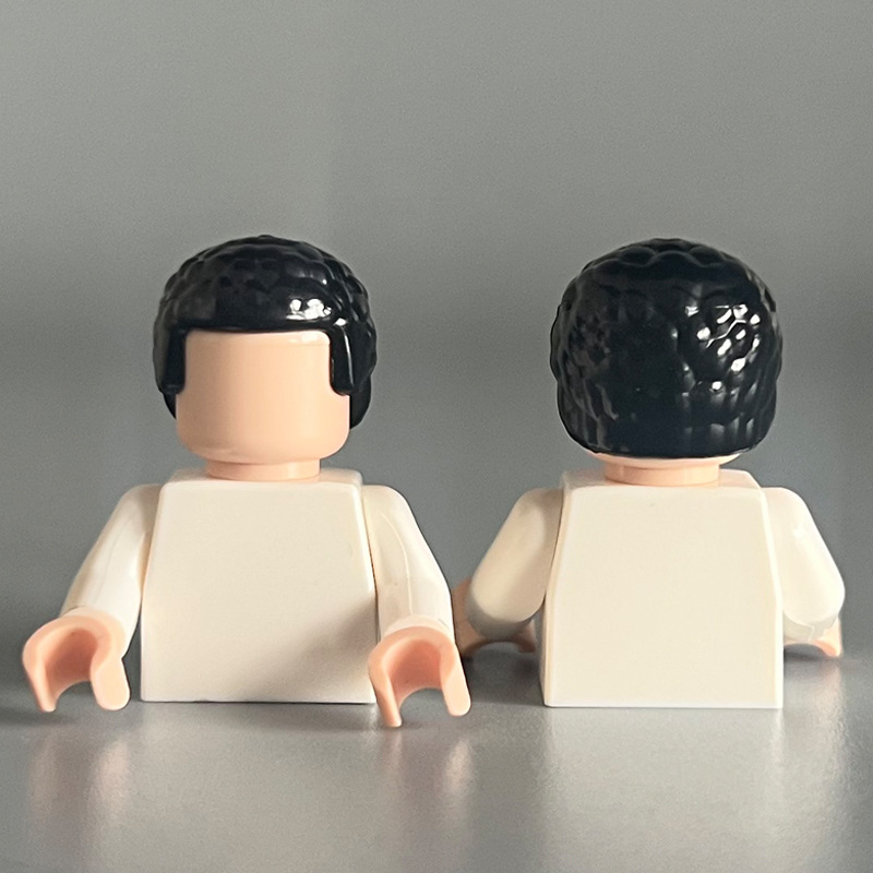 21778 considers herself black with curly short hair