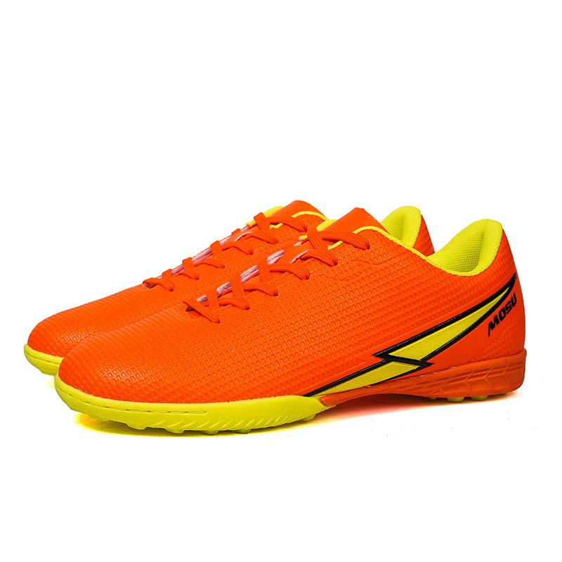 2025 nuevos zapatos de fútbol juveniles de clavos largos transfronterizos para hombres y mujeres fábrica de botas de fútbol