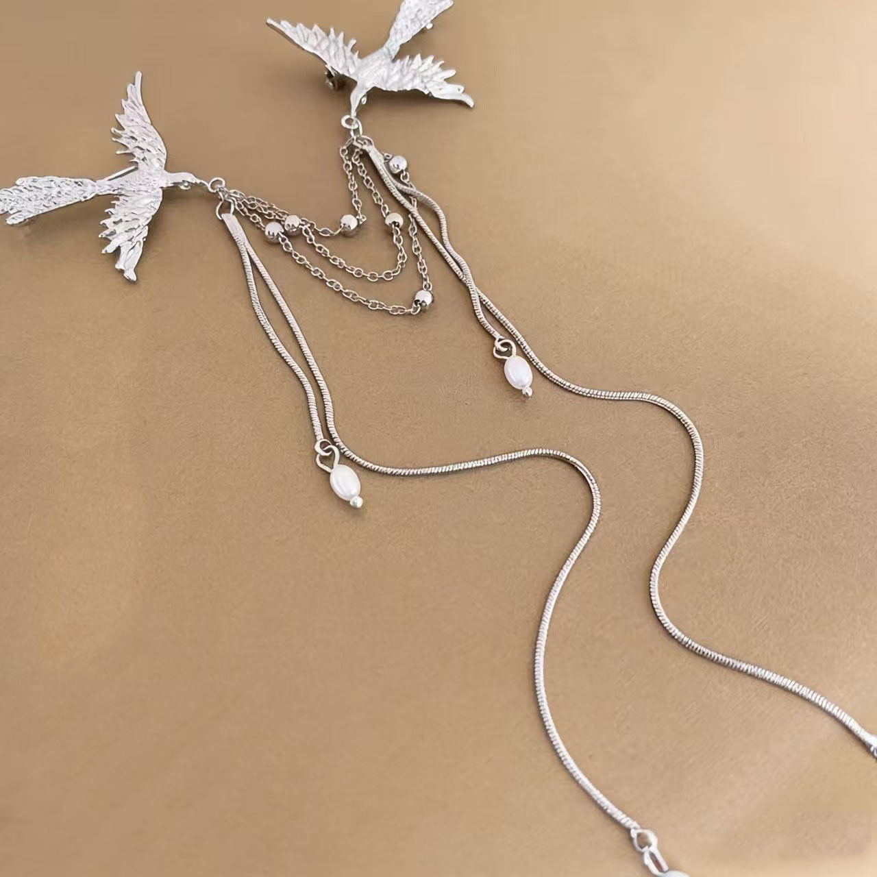 Exclusieve vogel broche met kwastjes voor dames elegante corsage_voghion.com