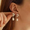 Golden earrings from pearl, flowered