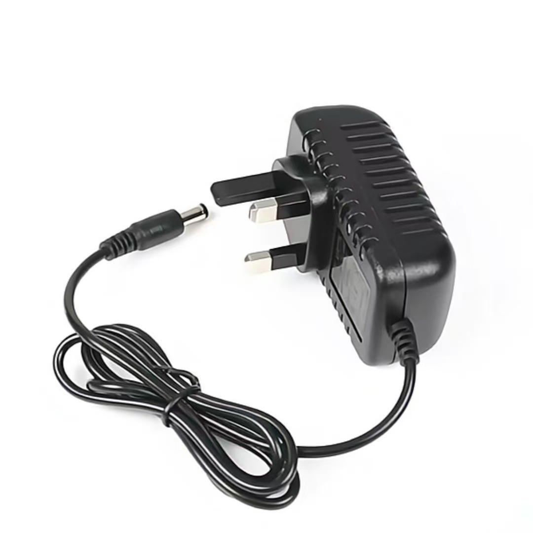 Inventario 12V2A adaptador de alimentación 3C certificación estándar nacional 12V3A mediano monitor de audio enrutador eléctrico image 11