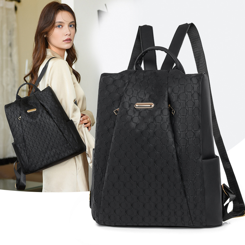 2024 nueva mochila de moda tejida de gran capacidad bolso de mujer simple y versátil mochila portátil de viaje