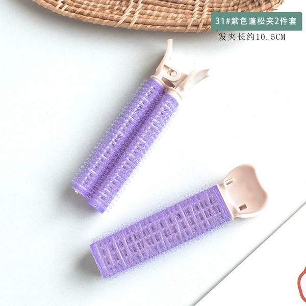 2 pieces of 31# purple fluffy clips