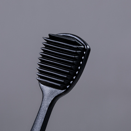 RAOYI new black and white spiral bristle toothbrush tongue scraping brush combination adult household soft bristle toothbrush manufacturer wholesale