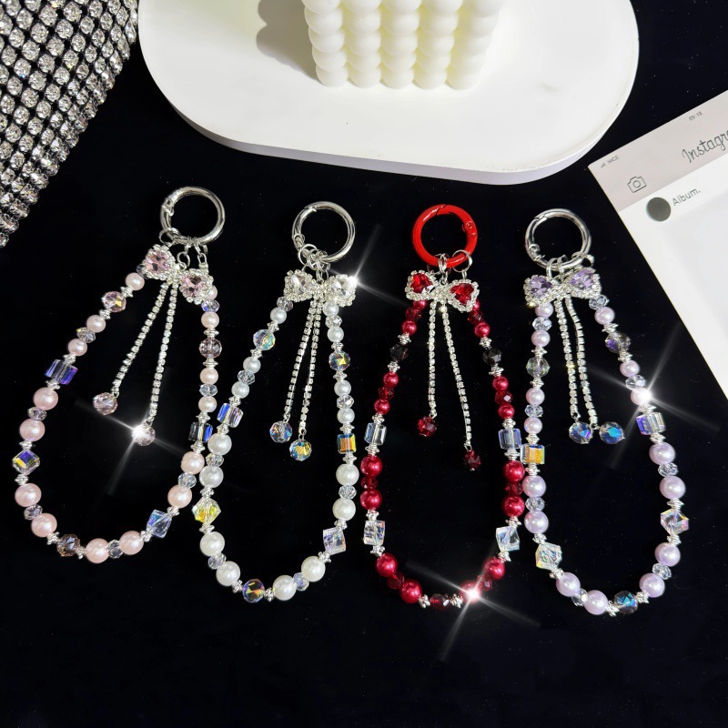 Ligero lujo rhinestone bowknot cadena de teléfono móvil colgante de cristal cadena de muñeca joyería mujer alta sensación cordón de teléfono móvil