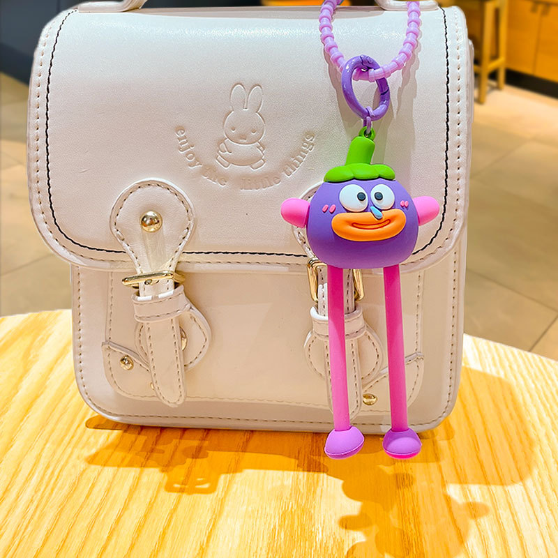 Cartoon stretch ugly fruit gentleman keychain creative pull decompression doll couple car bag pendant gift Cartoon stretch ugly fruit gentleman keychain creative pull decompression doll couple car bag pendant gift