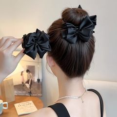 黑色双蝴蝶结丸子头抓夹高级感2025新款百搭显发量发夹女通勤发饰