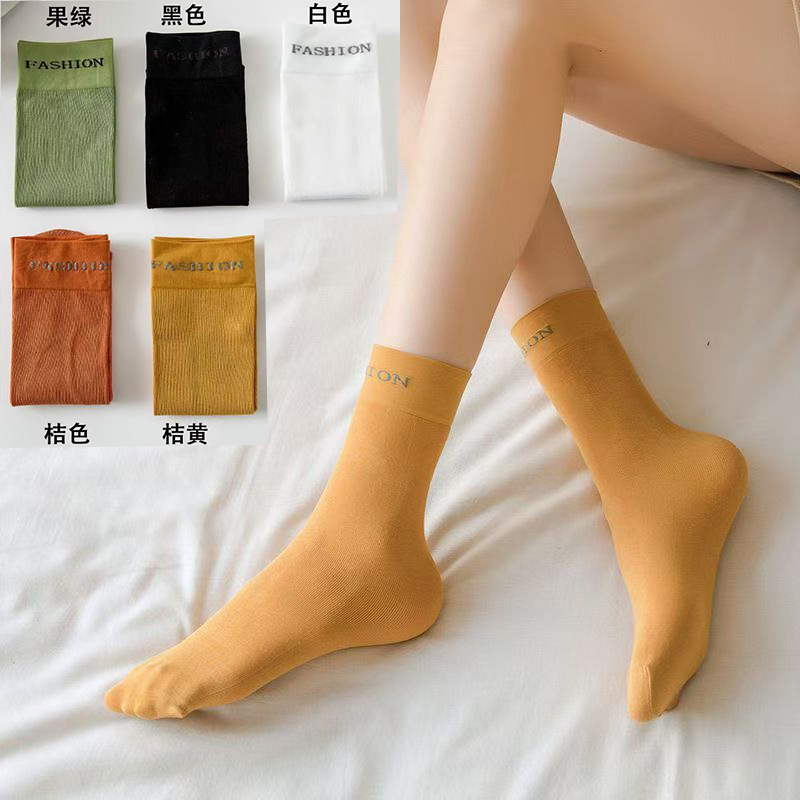 2025 nuevos calcetines de moda personales coreanos de color caramelo primavera y verano calcetines de algodón delgados versátiles calcetines de viento universitarios