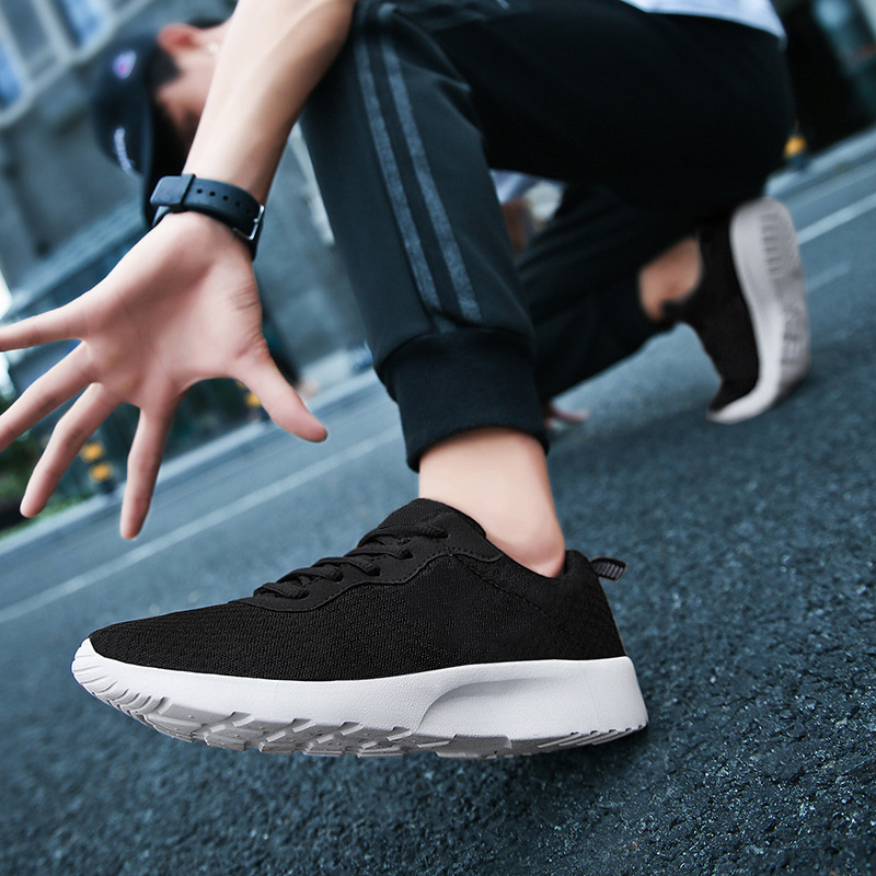 Cross-border mesh light and convenient low-top sports men's black and white casual shoes flying woven running all-matching plus size sneaker Cross-border mesh light and convenient low-top sports men's black and white casual shoes flying woven running all-matching plus size sneaker